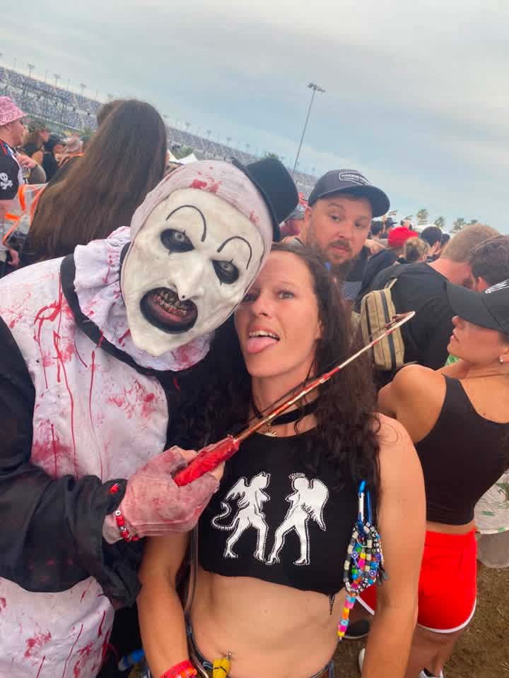 Art the Clown with a blade at a fan's throat at Daytona Speedway